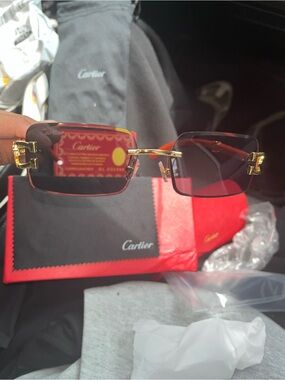 Cartier Gold Frame Sunglasses with Red Gradient Lenses